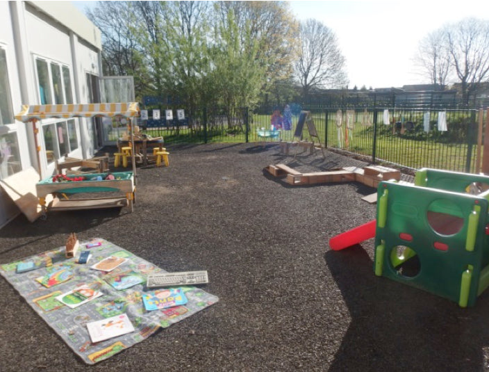 A photograph displaying the outdoor play area of Beagle Pre-School based in Castle, Northwich.