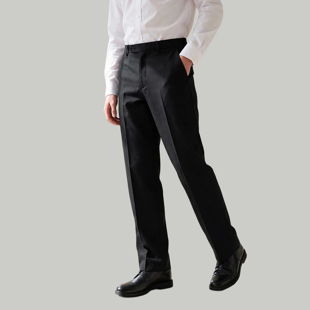 Model wearing Boys School Trousers in Black